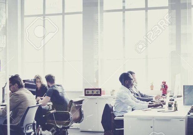 53103303-business-team-busy-talking-workplace-concept